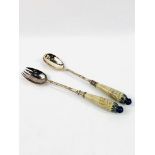 A Pair of Salad Servers by Hannah Barlow for Doulton, Lambeth.