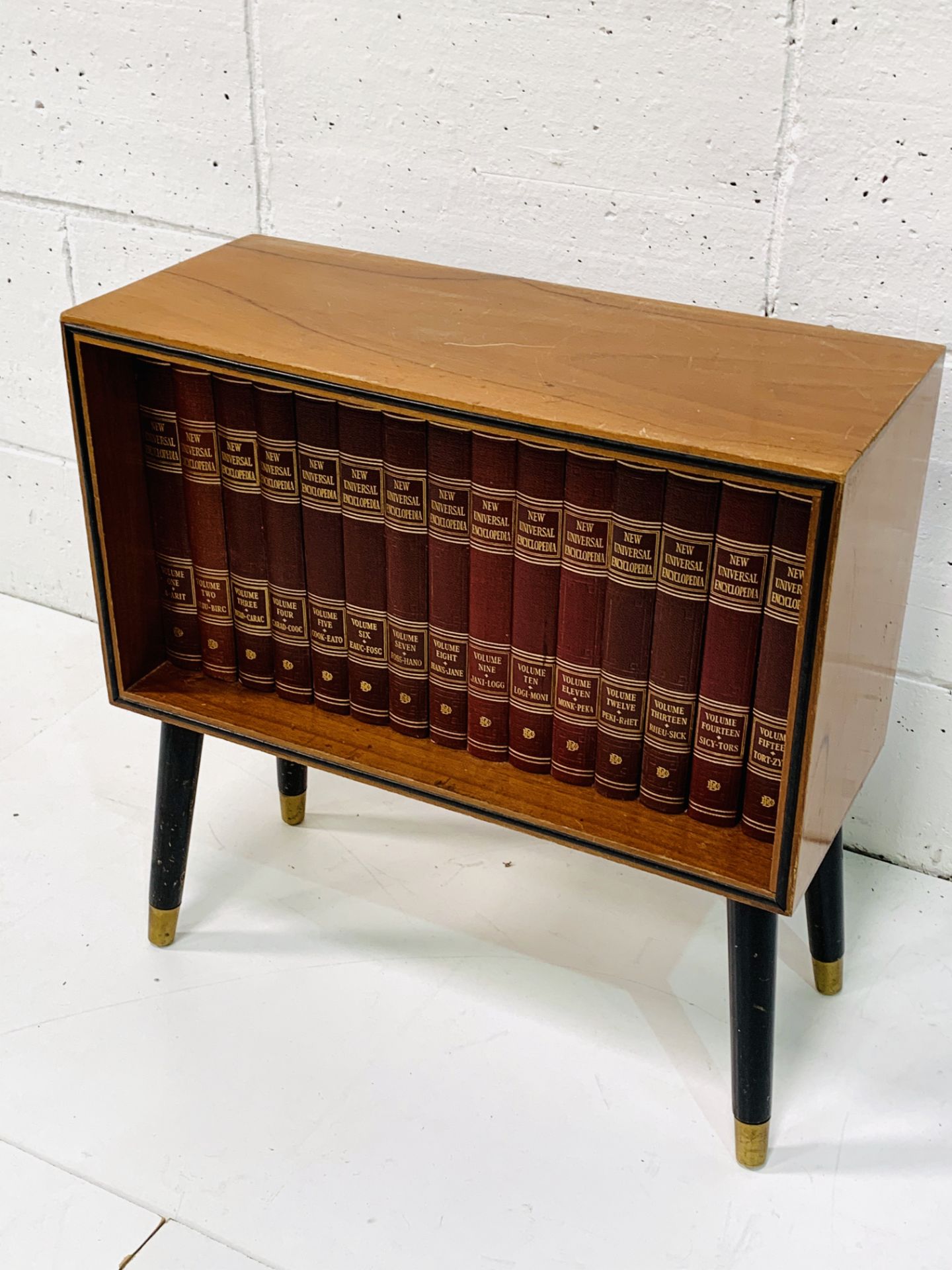 Teak small 1950's bookcase on legs with a complete set of the New Universal Encyclopedia. - Image 3 of 3