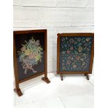 Two oak framed fire screens with tapestry decoration behind perspex.