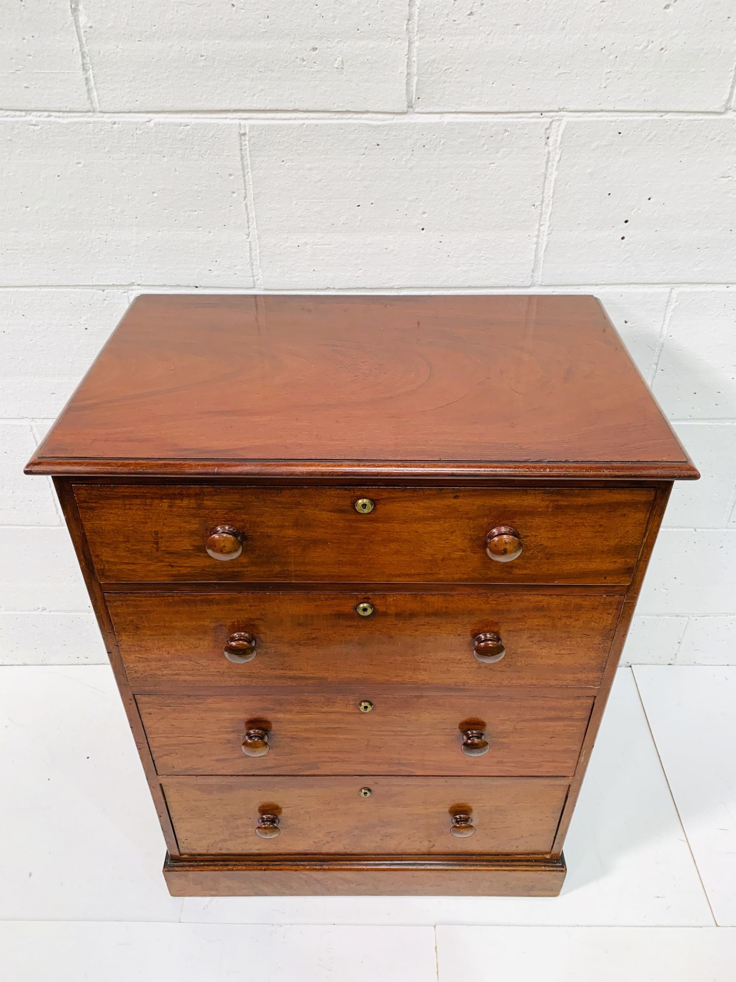 Mahogany chest of four graduated drawers by Spillman and Co. - Image 4 of 8