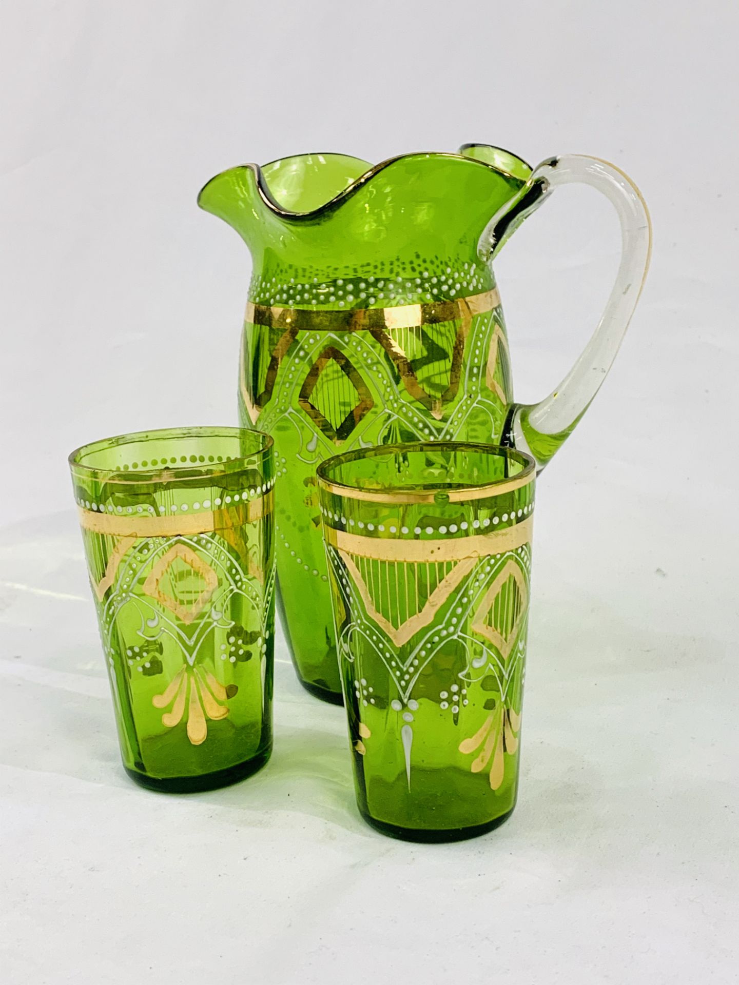Victorian gilt decorated green glass jug and two beakers. - Image 2 of 2