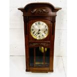 Mahogany case pendulum wall clock, going.