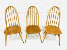 Three Ercol high back Windsor chairs.