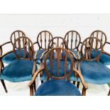 Set of eight mahogany Regency style open elbow chairs upholstered in petrol blue velvet.