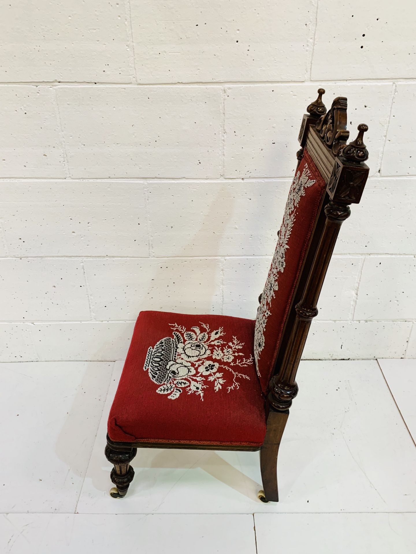 Carved mahogany framed high back hall chair with bead embroidered seat and back on ceramic casters. - Image 3 of 4