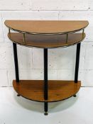 1950's demi-lune display table.