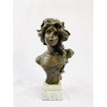 Bronzed plaster female bust on a marble plinth