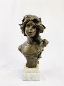 Bronzed plaster female bust on a marble plinth