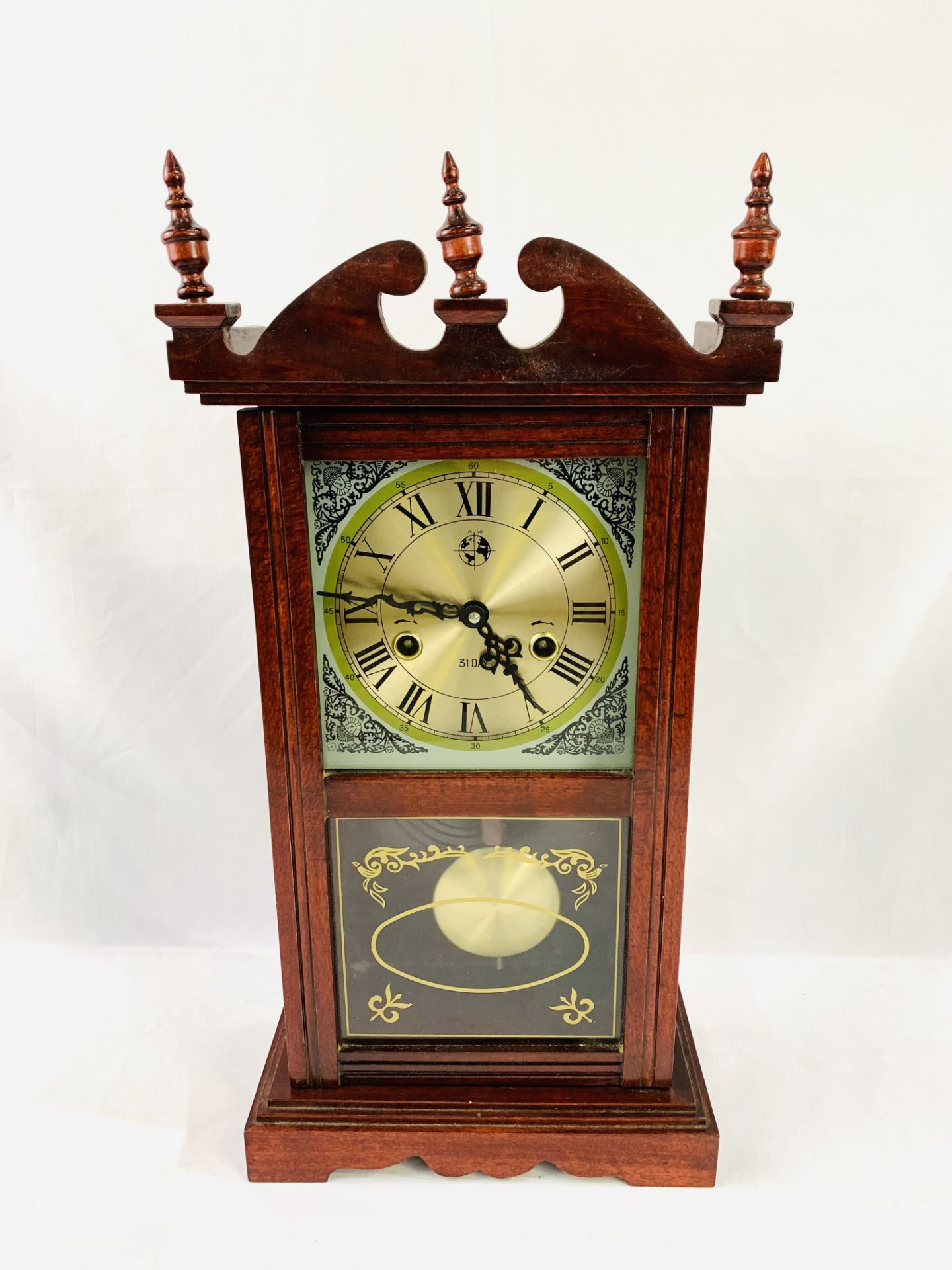 Austrian style 31 day striking mantel clock with visible pendulum