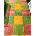 Hand knotted multi-coloured panel carpet.