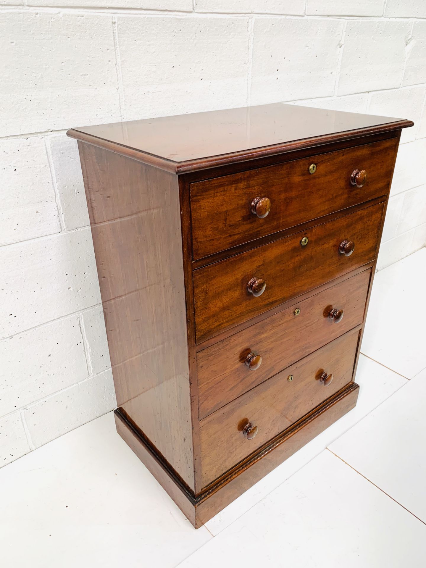 Mahogany chest of four graduated drawers by Spillman and Co. - Image 2 of 8