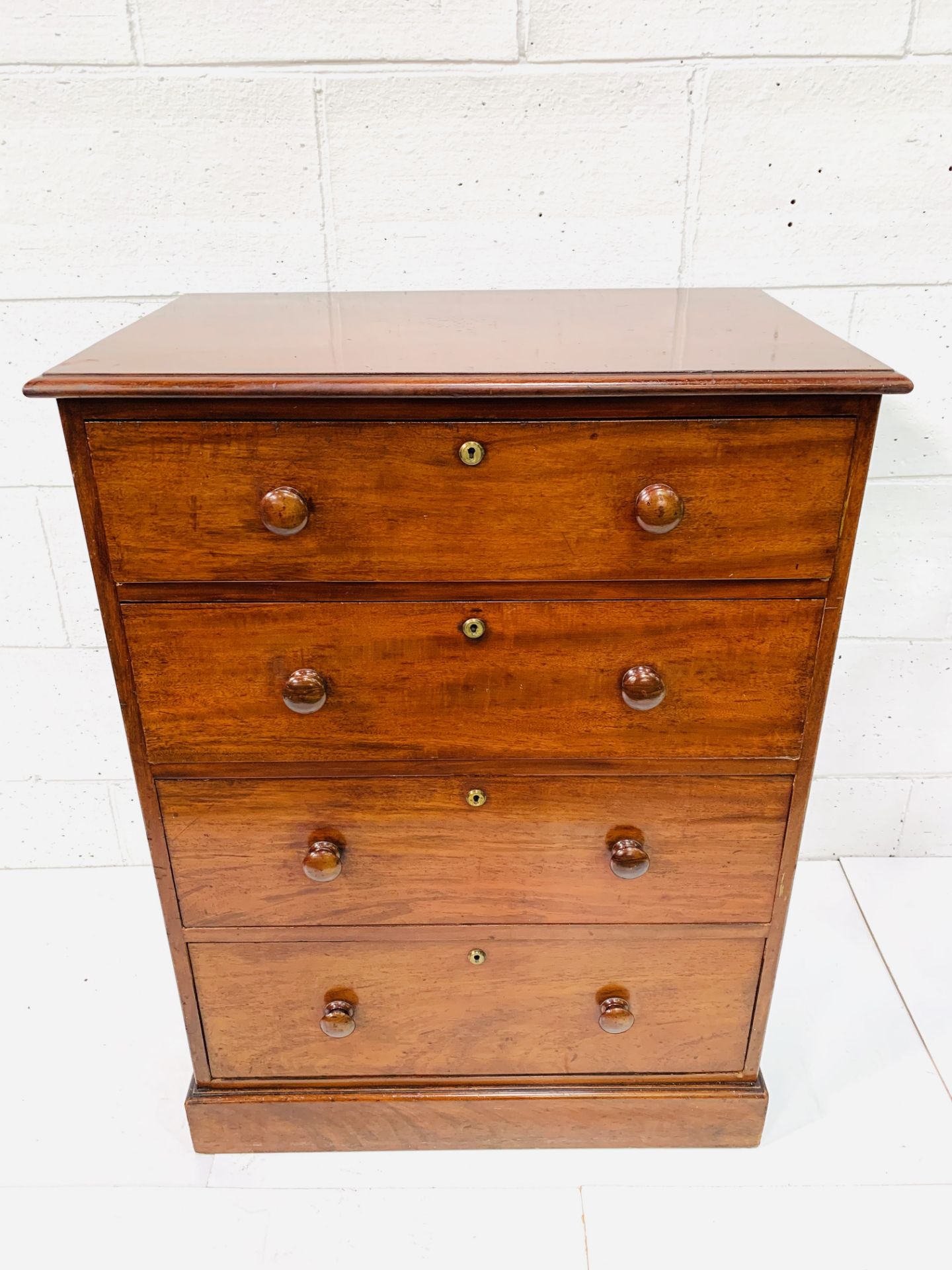 Mahogany chest of four graduated drawers by Spillman and Co. - Image 8 of 8