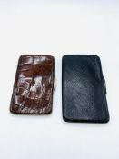 A crocodile skin wallet together with a black leather and hallmarked silver wallet