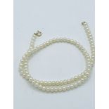 Yellow gold clasp freshwater pearl necklace length 42cms