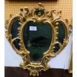 Georgian wall mirror with ornately carved gilt plaster frame
