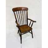 Elm seat high back farmhouse open armchair with spindle back.