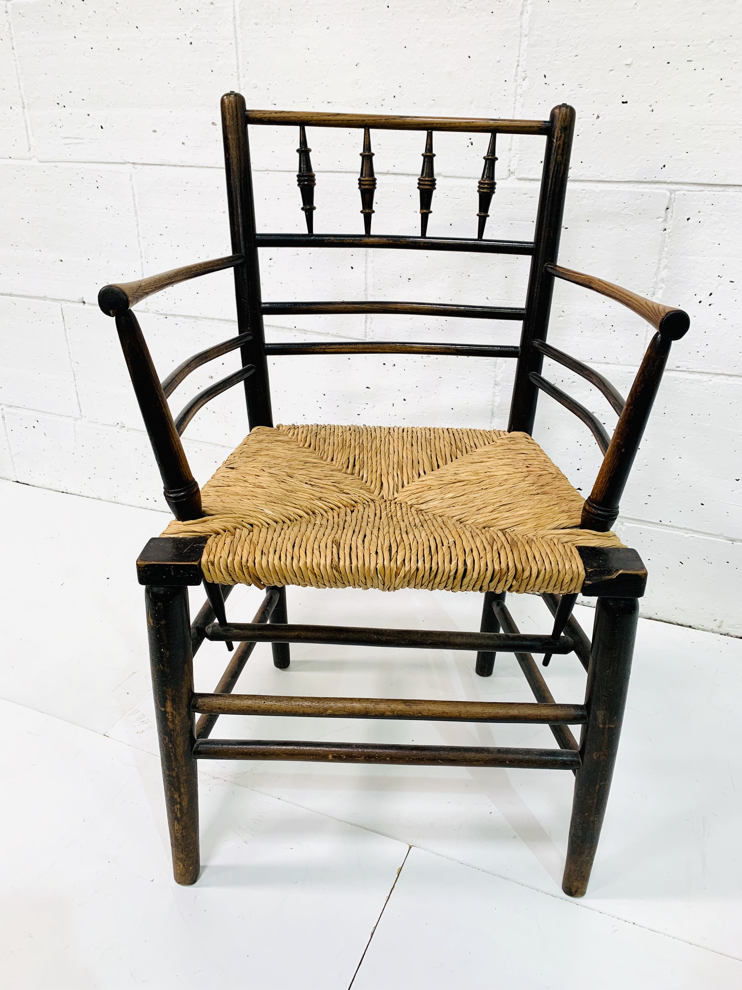 A late Victorian Morris & Co. ‘Sussex’ chair oak framed rail back open arm chair. - Image 3 of 5