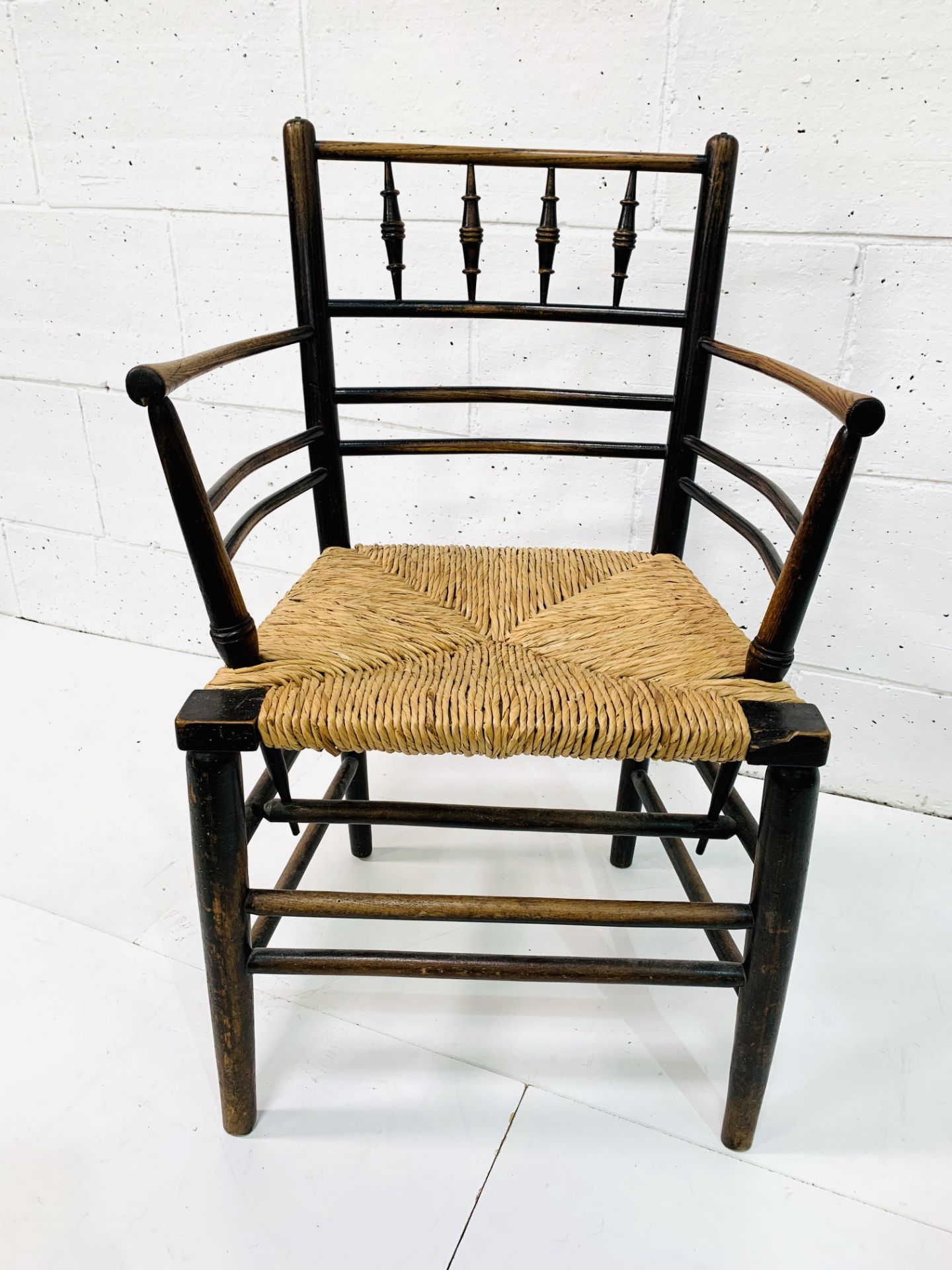 A late Victorian Morris & Co. ‘Sussex’ chair oak framed rail back open arm chair. - Image 3 of 5