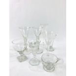A collection of 8 18th Century and later drinking glasses