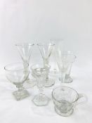 A collection of 8 18th Century and later drinking glasses