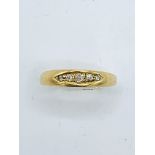 18ct gold ring set with 5 diamonds, size O1/2