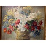 Oil on board of still life flowers, unsigned. On reverse a label handwritten Stella Wright.