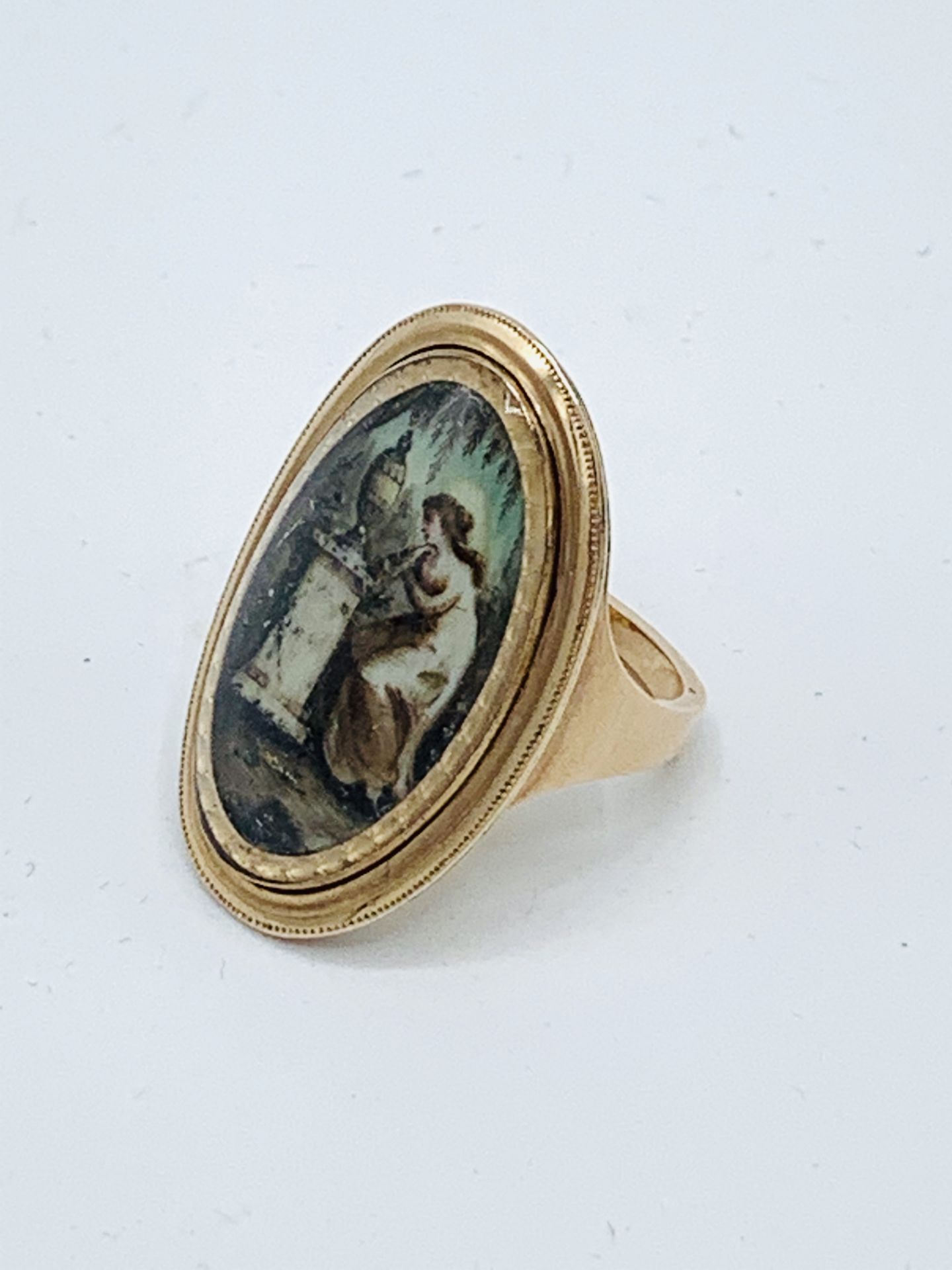 Georgian portrait ring dated 1792. Length 30mm, width 20mm. Size M. Wt. 6.5gms. Inscribed underside