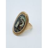 Georgian portrait ring dated 1792. Length 30mm, width 20mm. Size M. Wt. 6.5gms. Inscribed underside