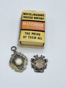 2 hallmarked silver medallions and a Matchbox miniature Whyte & Mackay's whisky
