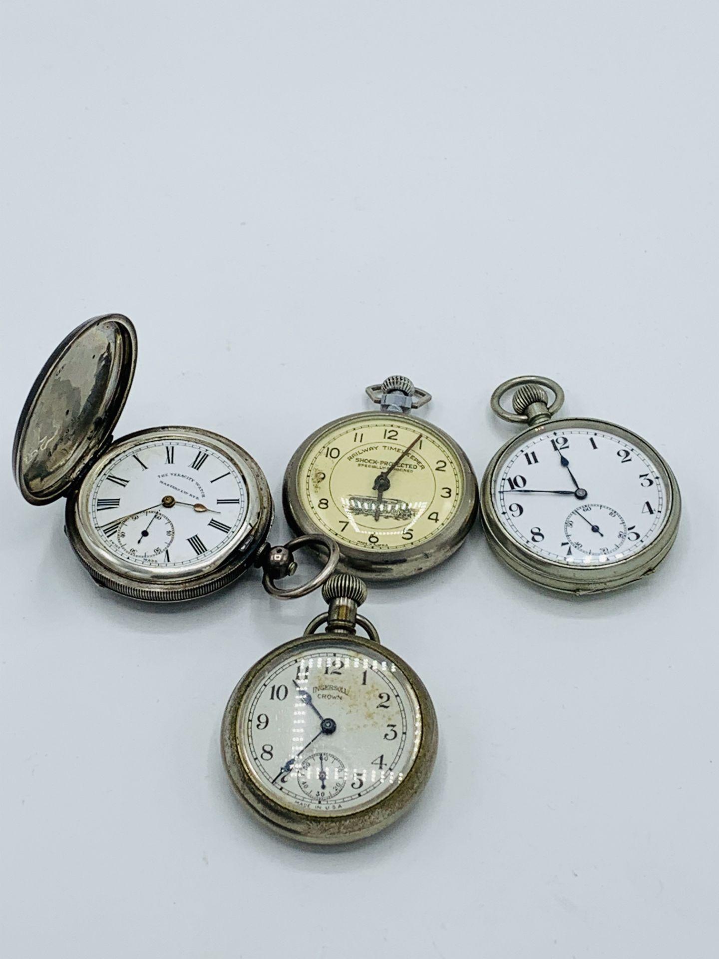Silver case pocket watch marked The Veracity Watch, Masters Ltd., Rye; and 3 other pocket watches