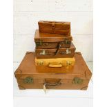 Large leather suitcase; and other leather cases