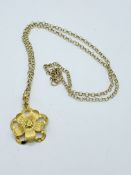 9k gold flower pendant and necklace.