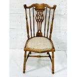 Elm framed rail back chair with carved splat.