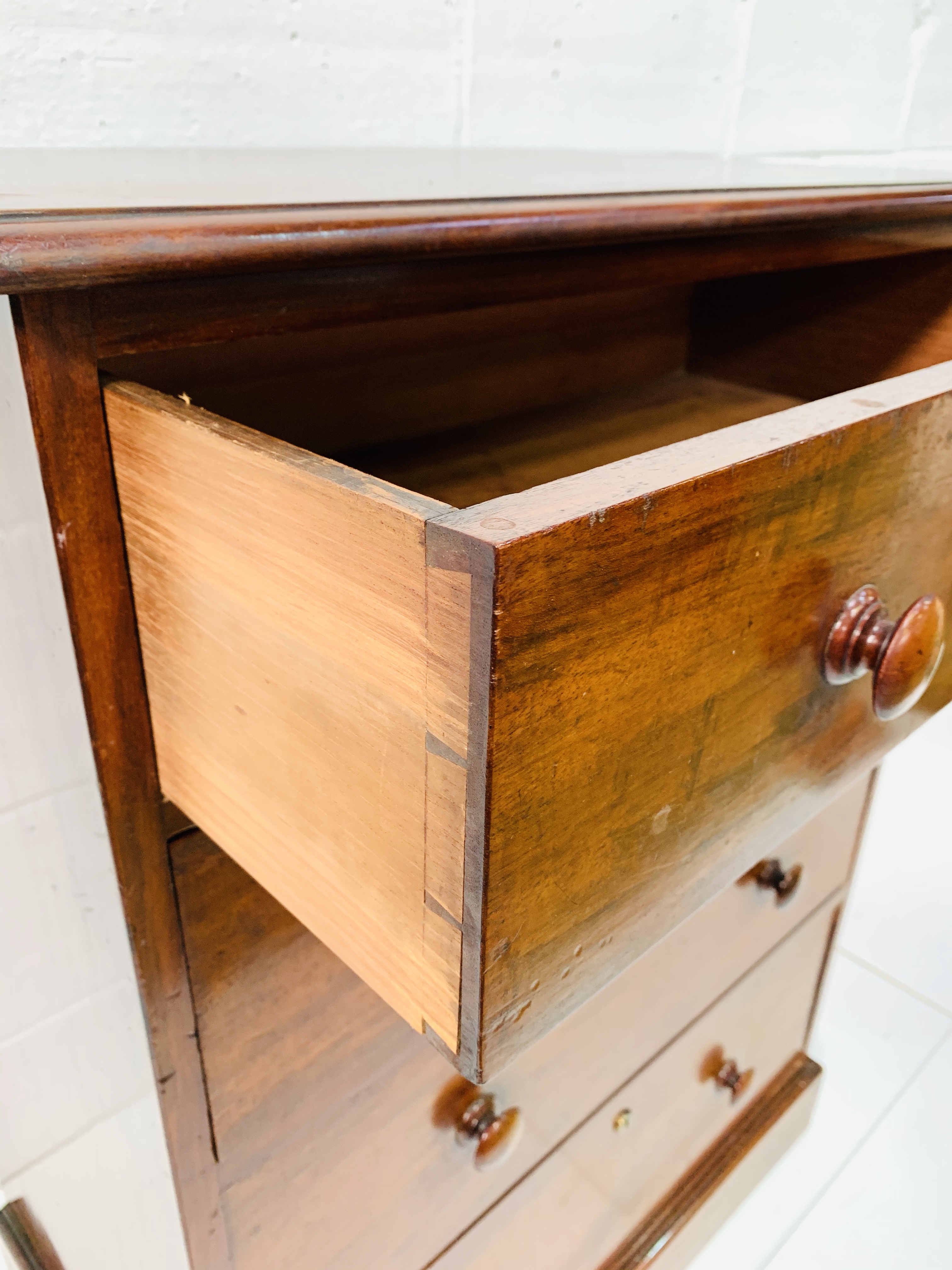 Mahogany chest of four graduated drawers by Spillman and Co. - Image 5 of 8