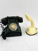 1960s Ericsson Ericofon and a 1950s black bakelite telephone