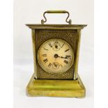 Gilded musical carriage clock with secondary dials and musical alarm.