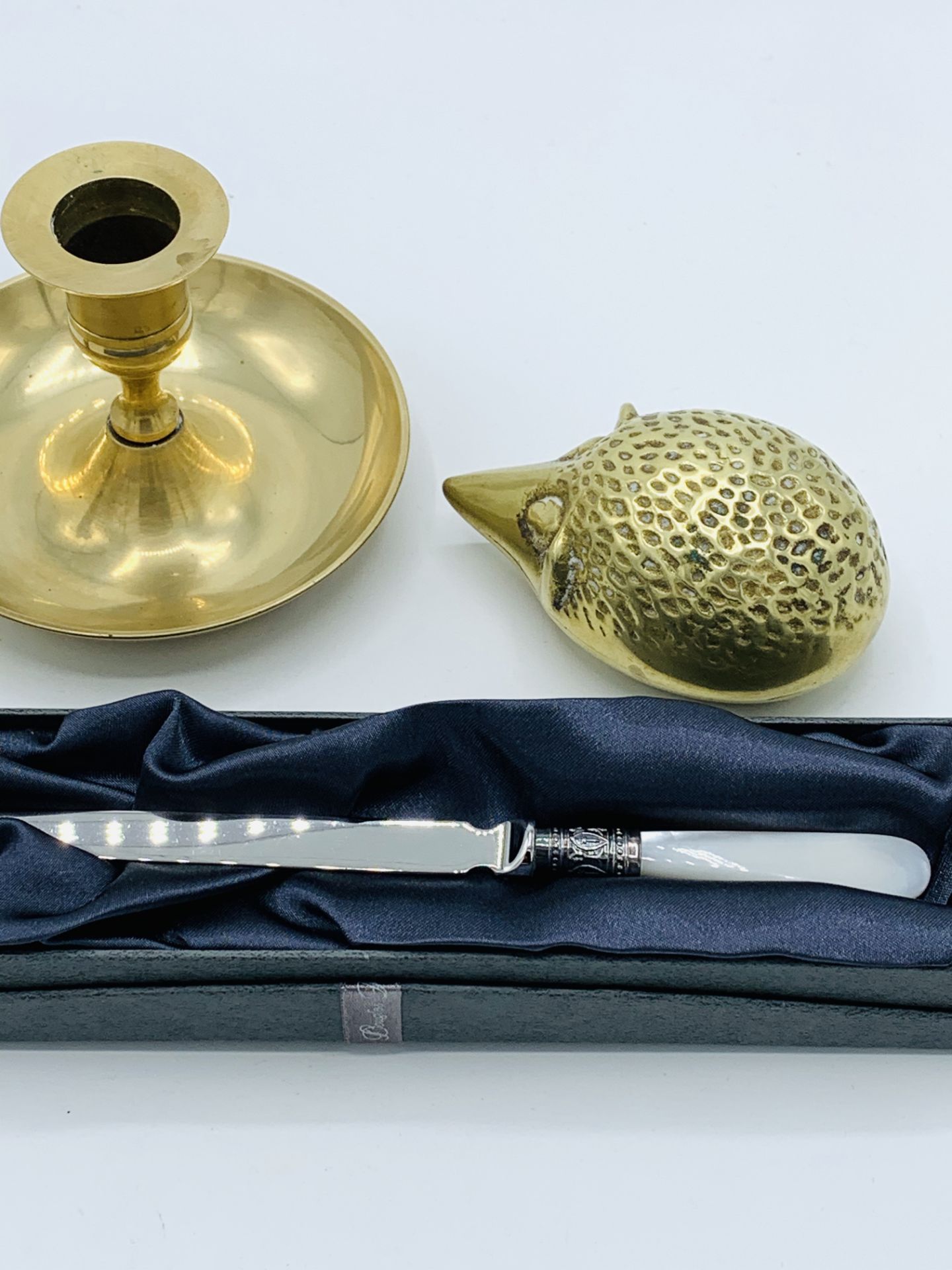 Brass hedgehog, brass candle holder and a boxed Douglas Pell mother of pearl handled paper knife - Image 2 of 2