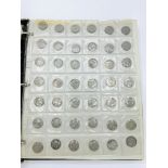 An album containing GB silver coins amounting to over 16 ozt of silver, plus a quantity of other GB