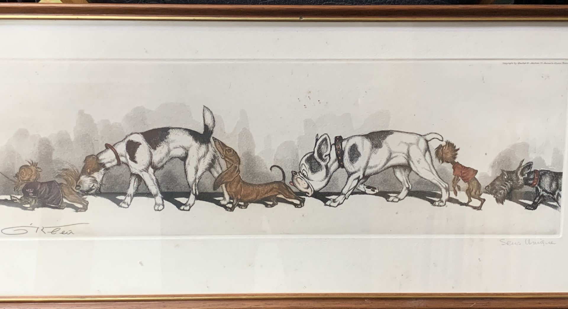 Pair of framed and glazed dog prints by Boris O'Klein: "Sens Unique" and "Le Tricheur"