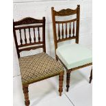 Two mahogany framed Edwardian rail back chairs with upholstered seats.