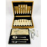 Case of 8 mother of pearl handled and silver dessert knives and forks; silver cutlery and a trio