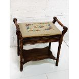 Oak framed stool with tapestry upholstered lifting seat and shelf beneath.