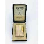 Gold plated lighter by S T Dupont, in original case