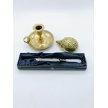 Brass hedgehog, brass candle holder and a boxed Douglas Pell mother of pearl handled paper knife