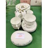 Collection of French porcelain, including Limoges; plates, cups, saucers, and a large porcelain egg