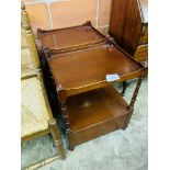 Pair of mahogany occasional tables with display shelf and two drawers below.