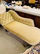 Edwardian champagne coloured velour button back upholstered chaise longue on casters.