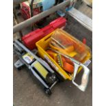 Hydraulic trolley jack, breakdown warning triangle and other items.