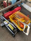 Hydraulic trolley jack, breakdown warning triangle and other items.