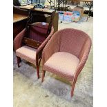 Pair of Lloyd Loom chairs with upholstered seats.
